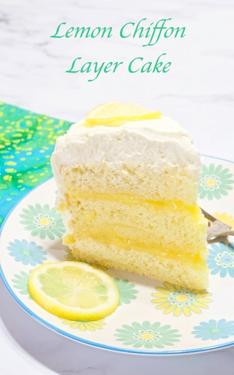 This Lemon Chiffon Cake is moist, lemony, delicate, and delicious. It has a moist and tender crumb, and the texture is between a dense butter cake and a light and airy sponge cake.  Lemon curd is tucked between the layers and it’s finished with a delicious whipped frosting! #lemon #lemonchiffoncake #chiffoncake #cake #lemoncake Lemon Heaven Sponge Cake, Light And Fluffy Lemon Cake, Lemon Fluff Cake, Fancy Lemon Cake, Lemon Zest Cake, Lemon Filling Cake, Lemon Curd Cake Recipe, Lemon Cake Ideas, Vanilla Lemon Cake