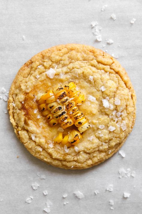 The cookie eats like a soft and chewy sugar cookie, but we immediately take a big detour from familiarity with the hit of corn flavour. The base of this cookie is all-purpose flour, lots of freeze dried corn powder, and Corn Pops cereal. The last step is optional, but highly recommended: topping each cooking with a piece of bruléed summer sweet corn. Sweet Corn Dessert, Sweet Corn Cookies, Fancy Cookie Recipes, Corn Dessert, Corn Pops Cereal, Fried Cookies, Pops Cereal, Chewy Sugar Cookie, Corn Cookies