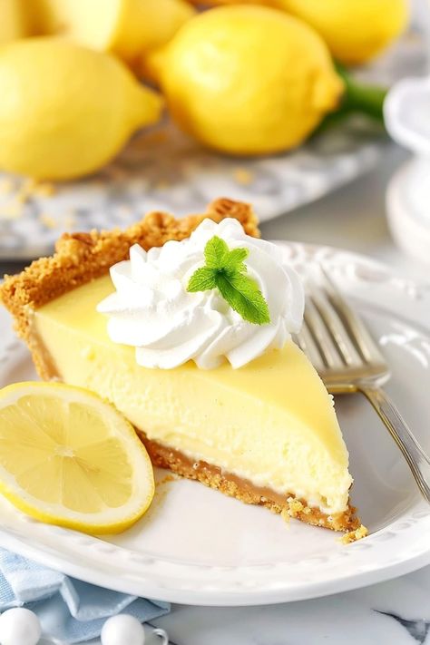 No-Bake Lemon Icebox Pie Recipe - Insanely Good Creamy Lemonade, Lemon Pie Receta, Easy Lemon Pie, Lemon Icebox Pie, Lemonade Pie, Lemon Cream Pies, Icebox Pie, Squeezed Lemon, Cracker Crust