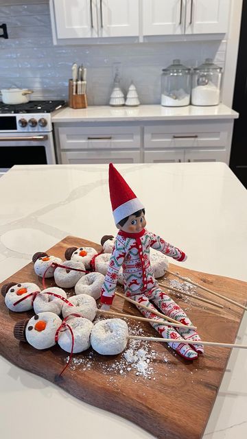 Good Elf On The Shelf Ideas Easy, Dec 1st Elf On The Shelf Ideas, Donut Elf Arrival, Elf On The Shelf White Donut Ideas, Elf On The Shelf With Christmas Tree, Elf On The Shelf Return Donut, Elf Do You Want To Build A Snowman, Elf On The Shelf Mini Donut Ideas, Elf On The Shelf Ideas Treats