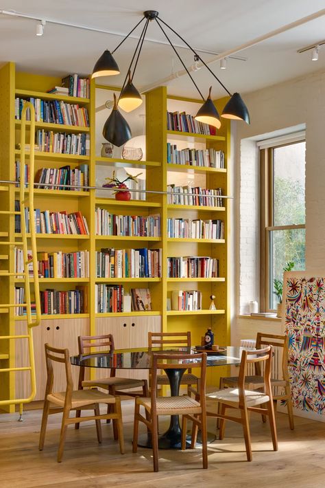 Photo 4 of 15 in A Yellow Floor-to-Ceiling Library Wall Brightens Up This SoHo Loft - Dwell Ceiling Library, Yellow Bookshelves, Yellow Floor, Bookshelf Inspiration, Soho Loft, Library Wall, Prefab Homes, Modern Homes, Feature Wall