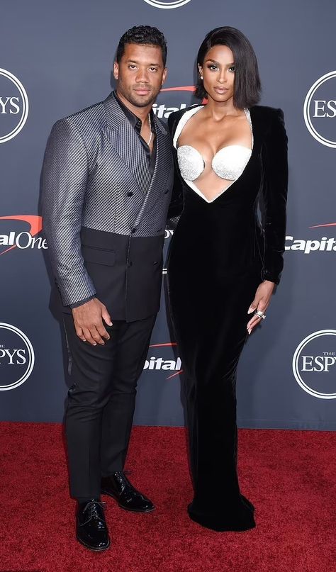 Ciara and husband Russell Wilson Couples Hanging, Male Athletes, Ciara And Russell Wilson, Ciara And Russell, Russell Wilson, Athletic Men, Celebrity Couples, Hanging Out, Weddings