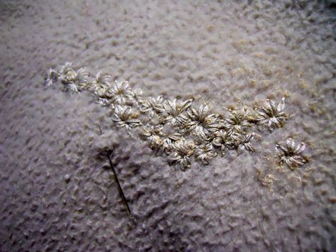 Covering Paint Stains w/ daisy embroidery — Made Just For U Embroidery Over A Stain, Embroider Over Stains, Covering Stains With Embroidery, Embroidery Over Stains, Embroidery To Cover Stains, Baby Crib Quilt, Daisy Embroidery, Stain On Clothes, Learning To Embroider