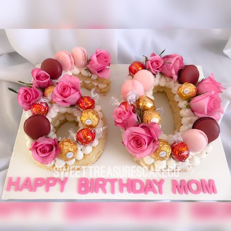 60th birthday treats😍😍.   #sweettreasures #sweettreasurescakeco #cake #johannesburg #southafrica #birthday #jozi #celebrations #celebrationcakes #party #60thbirthday #60yearsyoung #mom #freshflowers #macaroons #lindt #ferrorocher #numbercake 66th Birthday Ideas For Mom, 60th Birthday Ideas For Mom Cake, 60 Cake Ideas, Cake Ideas For Mom, Birthday Cake Display, Birthday Party For Mom, Cake Display Ideas, 60 Cake, 60th Bday Ideas