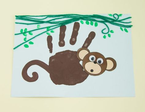 Handprint Monkey - Twinkl Craft Idea: Handprint Monkey, Rainforest Crafts, Hand Print Art, Fall Newborn, Jungle Crafts, Zoo Crafts, Monkey Crafts, Footprint Crafts, Umbrella Stroller