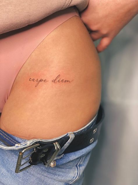 Tattoos Above Elbow Crease, Hip Tattoo Words, Hip Tattoos Women Words, Hip Quote Tattoo, Back Writing Tattoos, Mini Hip Tattoos, Mini Tattoos For Girls, Intimate Tattoo, Tattoo Carpe Diem