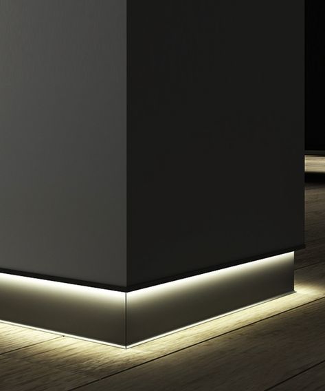 This aluminum toe-kick LED baseboard light by Alcon Lighting adds sophistication to modern commercial, residential and hospitality interiors. The baseboard strip light is installed to sit flush with the drywall's surface and has a frosted lens for even light distribution. The slim profile light strip can be cut to the desired shape in the field and is offered in a continuous run. Our baseboard lighting delivers 250 lumens per foot of power with a 120º beam spread with an optional remote dim Led Baseboard, Baseboard Lighting, Baseboard Ideas, Toe Kick Lighting, Hemp House, Nola House, Modern Baseboards, Profile Light, Master Baths