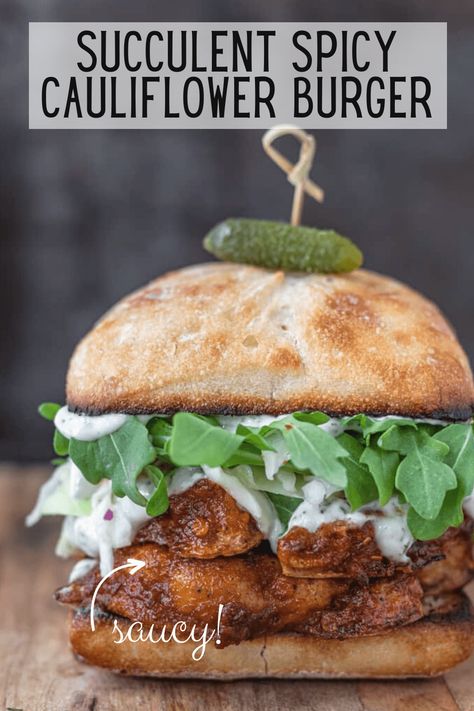 Easy to make, saucy spicy cauliflower burger made with roasted cauliflower and vegan tzatziki sauce. Melt-in-your-mouth deliciously tender with crispy edges. |simplyceecee.co #veggieburger #cauliflower #spicy Crispy Cauliflower Sandwich, Cauliflower Burger Patties, Cauliflower Burger Recipes, Vegan Chicken Burger, Vegan Burgers Recipes, Burger Melt, Cauliflower Burgers, Vegan Burger Recipes, Cauliflower Sandwich