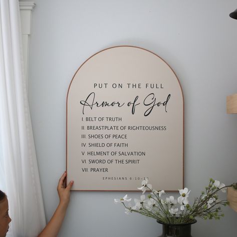 ~~ We do custom verses, please message us what scripture you would like, and we will send you a link to purchase through :) ~~ **Sign comes with verse (Ephesians 6:10) ** You choose the sign color (Black, white, smokey beige) as well as the leather frame color (Black, Cognac (tan * Choose from 4 different sizes in the drop down menu: (16x20) (20x24) (24x30) (30x36) * Handmade wood sign * Constructed from treated 3/4" plywood * Sign is pictured in **Smokey beige/Black lettering/Tan leather frame** **Every sign we create is handmade from start to finish, so there will be variations in texture, technique and overall appearance. We use 3/4" maple plywood, so some pieces may include slight lines, cracks, indentations. All the leather we use is purchased from a harness shop that cuts genuine cow Christian Dining Room Decor, Christian Wall Decor Living Room, Shoes Off Sign Entryway, Diy Signs For The Home, Empty Wall Ideas Living Room, Arched Sign, Above Couch Wall Decor, Decorate Hallway, Cricut Wall Decor