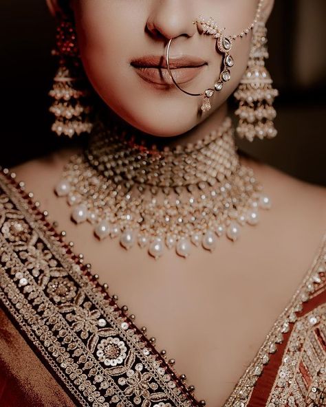 Latest Bridal Nath Designs For Indian Brides Bridal Nath Designs, Nath Designs, Nose Pin Indian, Nath Bridal, Bridal Nath, Nose Ring Designs, Indian Brides Jewelry, Nose Jewels, Bridal Ornaments