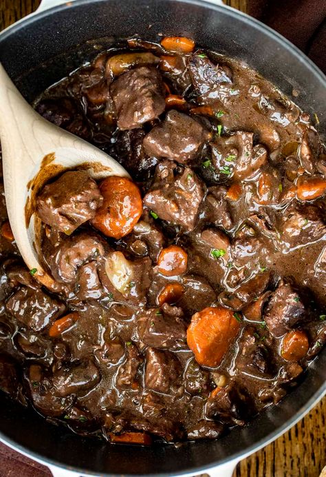 Beef Bourguignon, also known as Beef Burgundy, is tender beef that is simmered in a red wine gravy with lots of vegetables. Beef Burgundy, Beef Recipes, Soup Recipes, Comfort Food, One Pot Dinners, red wine in cooking, recipes, i am homesteader, iamhomesteader, Soup Recipes Comfort, Beef Bourguignon Slow Cooker, Beef Burgundy, Wine Gravy, Red Wine Gravy, Pot Beef Stew, One Pot Dinners, Pot Roast Slow Cooker, Beef Chuck Roast