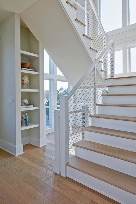 Showcase: Explore Features - Marnie Custom Homes Coastal Stair Railing Ideas, Beach House Staircase, Coastal Staircase, Cable Railing Interior, Beach House Stairs, Duplex Ideas, Interior Stair Railing, Dining Room Paint Colors, Cottage Plans