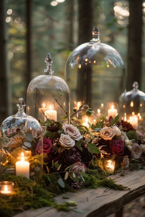 Create a dramatic ambiance with moody wedding centerpieces in rich colors and textures. Get inspired here. Fall Chic Wedding Decor, Decor For Wedding Tables Reception Ideas, Book And Candle Wedding Centerpieces, Moody Jewel Tone Wedding Table Settings, Bohemian Wedding Centerpieces Boho Chic, Clear Wedding Centerpieces, Wedding Centerpieces Fairytale, Candle Centerpieces For Dining Table, Do It Yourself Wedding Centerpieces