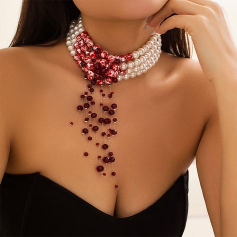 Step into the realm of darkness with our Bloody Pearl Necklace Vampire Goth Aesthetic Jewelry. This stunning piece is crafted to exude elegance with a touch of macabre, perfect for those who embrace goth style and vampire aesthetics. Made from high-quality faux crystal, dripping blood, and imitation pearls material, this necklace is sure to make a statement. Free shipping in the US and worldwide. Elevate your style with a necklace that's both captivating and bold. The Bloody Pearl Necklace features intricate details, including dripping blood accents and faux pearls, adding a mystical allure to any outfit. Gothic Elegance: Embrace your dark side with this striking necklace, designed to complement goth style and vampire aesthetics effortlessly. High-Quality Materials: Crafted from premium fa Vampire Goth Aesthetic, Blood Necklace, Vampire Necklace, Vampire Jewelry, Vampire Clothes, Goth Vintage, Cosplay Jewelry, Vampire Goth, Red Blood