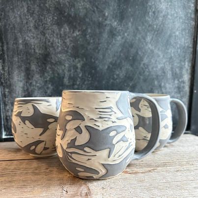 Discover Surrey - Meet Sherrin Kovach, a sgraffito potter... Multi Color Sgraffito, Cool Mug Designs Ceramics, Scraffito Mug, Sgraffito Mug, Sgraffito Designs Easy, Ceramic Mugs Ideas, Whale Pottery, Scraffito Designs Simple, Clay Sgraffito