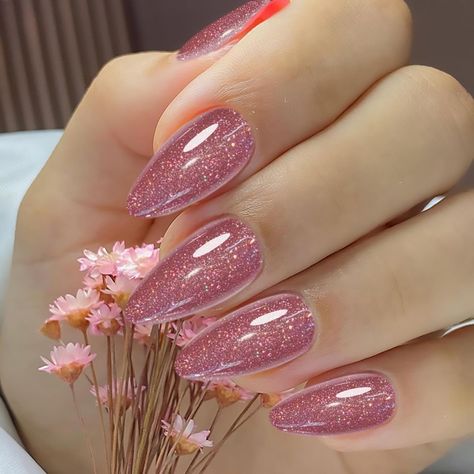 PRICES MAY VARY. 【SPARKLY GLITTER PRESS ON FALSE NAILS】Rimudecure light pink sparkly glitter press on fake nails have sparkling powder decorations that show different glitter effects in different lights, and there are multiple layers of protective nail polish to prevent the glitter from falling off and maintain a long-lasting sparkling shine,make your fake nails stand out. 【DURABLE AND LONG-LASTING】UV crystal coating prevents glitter from falling off, enhances translucent and bright effects, and Pink Soarkly Nails, Sparkling Pink Nails, Bright Sparkly Nails, Pink Shine Nails, Baby Pink Glitter Nails, Nails Almond Medium, Pink Sparkle Nails, Pink Sparkly Nails, Shiny Nails Glitter