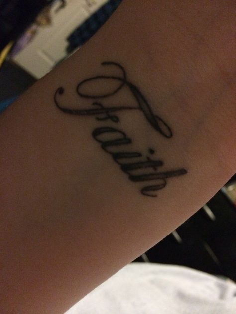 love my faith tattoo on my wrist Faith Tattoo Hand, Wrist Tattoos Letters, Word Faith Tattoo, Faith Arm Tattoo, Faith Tattoo Wrist, Bible Verses Tattoos, Tattoos For Wrist, Love Music Tattoo, Faith Tattoo On Wrist