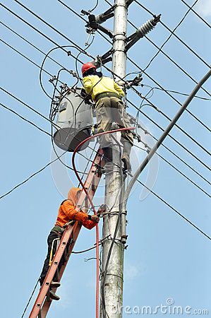 Electrical worker repairing the installation overhead power lines Overhead Power Line, Power Lines, Electrical Components, Mind Map, Power Plant, Puerto Rico, Electricity, Stock Images, Repair