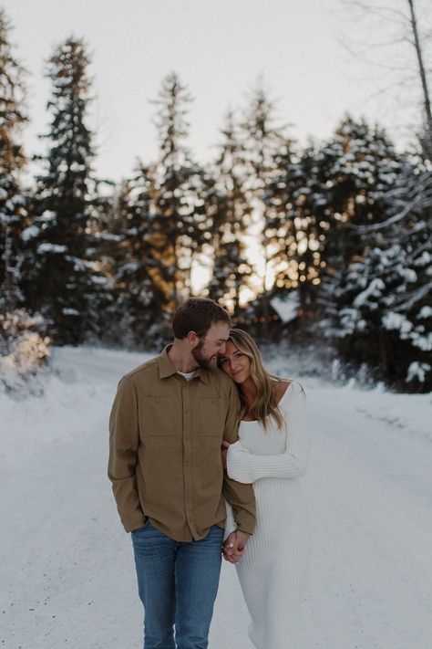 Outdoor Winter Engagement Photos | Fun Couples Photos Ideas | Alaska Engagement Photographer | I feel so grateful that I got to capture a beautiful adventure engagement in Alaska! I was in awe with the mountain engagement ideas! See tons of winter engagement fits, snow engagement aesthetic, forest couple romantic, and engagement photos outside! Book Theresa for your outdoor engagement photos or cozy couple photoshoot at theresamcdonaldphotographer.com! Cute Snow Couple Pictures, Winter Mountain Engagement Photos Outfits, Simple Winter Engagement Photos, Couple Photo In Snow, Switzerland Couple Photos, Outside Winter Engagement Pictures, Snow Poses For Couples, Couple Winter Photoshoot Outfits, Snowy Couples Photos