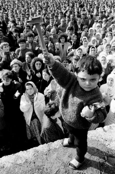 A young Turkish boy raises up a hammer during a solidarity rally for the 42000 miners on strike in  Zonguldak coal fields, November 1990. Coal Miners, Art Brut, Foto Art, Documentary Photography, Bw Photo, Photojournalism, Historical Photos, Vintage Photography, Old Pictures