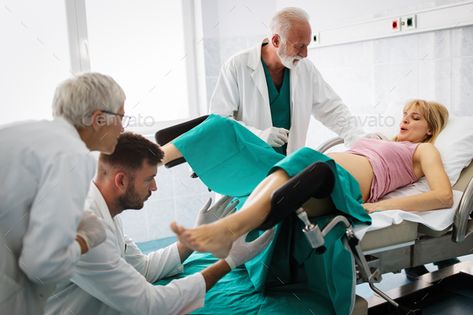 In the hospital woman in labor pushes to give birth, obstetricians assisting Gynecologist Visit, Gynecologist Exam, Normal Birth, Birth Pictures, Medical Photography, Massage Therapy Techniques, Birth Photos, Love Cover, Cell Biology