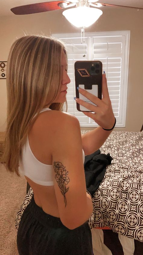 Cute Inner Arm Tattoos, Back Bicep Tattoos For Women, Flower Tattoo On Back Of Arm, Inside Forearm Tattoo Women Flower, Floral Tattoo Placement For Women, Tattoos On The Back Of The Arm, Back Of Upper Arm Tattoo Women, Upper Arm Flower Tattoos For Women, Maiden Name Tattoos For Women