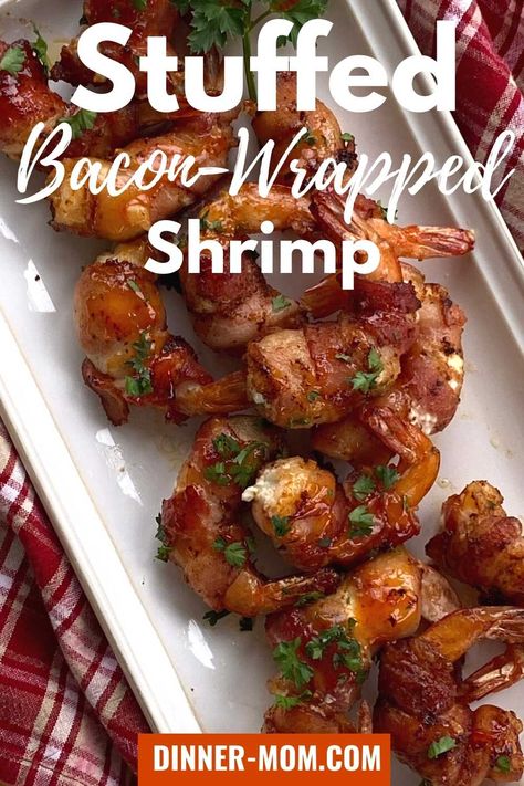 Stuffed Bacon-Wrapped Shrimp with cream cheese and jalapeños is an easy and impressive appetizer. This recipe has only 5 ingredients, making it a quick and delicious addition to any party menu. It's also low-carb and keto-friendly, so you can indulge without feeling guilty afterward! Shrimp And Bacon, Cream Cheese Stuffed Shrimp, Potato Wrapped Shrimp, Shrimp Wrapped In Bacon, Bacon Wrapped Shrimp In Oven, Stuffed Shrimp Recipes, Stuffed Shrimp Wrapped In Bacon, Bacon Wrapped Shrimp Air Fryer, Jalapeno Bacon Wrapped Shrimp