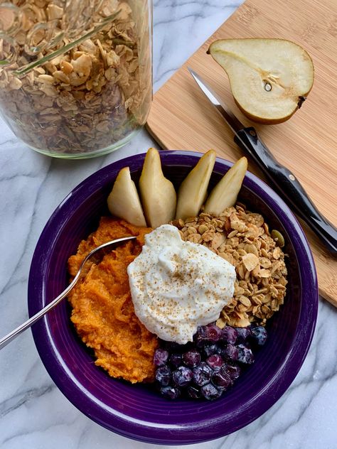 A purple bowl with sections of mashed sweet potato, blueberries, granola, and sliced pears, topped with Greek yogurt and cinnamon Sweet Potato Fruit Bowl, Sweet Potato Granola, Sweet Potato Breakfast Bowl, Whipped Sweet Potatoes, Orange Cardamom, Sweet Potato Mash, Potato Breakfast, Coconut Bacon, Sliced Pears