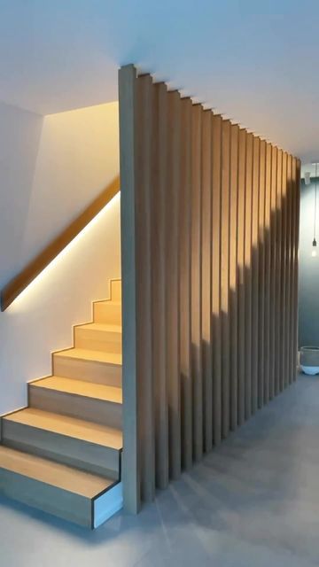 Home Visuals UK® on Instagram: "A Modern Staircase Design in Oak Wood 😍

The oak wood gives the staircase a warm and natural appearance, enhancing any space. The oak wood slats of the staircase railing not only create a visual highlight but also provide a harmonious connection between the floors.

Combining modern, clean design with the timeless beauty of oak wood, this staircase becomes a focal point in any room.

Video by: @padati_de

🎯Tag someone who NEEDS to see this!

——————————————————————————- 
Follow us @homevisualsuk for more!
Follow us @homevisualsuk for more!
——————————————————————————-
.
.
.
.
.
.
.
#homevisualsuk
#staircasedesign #staircase #foldingstaircase #modernliving #designideas #homedecor #stairwell #homebuilding #homeinspiration" Living Room Divider Ideas, Ideas For Stairs, Room Dividing, Interior Decor Inspiration, Modern Staircase Design, Room Video, Stair Well, Staircase Railing, Home Idea