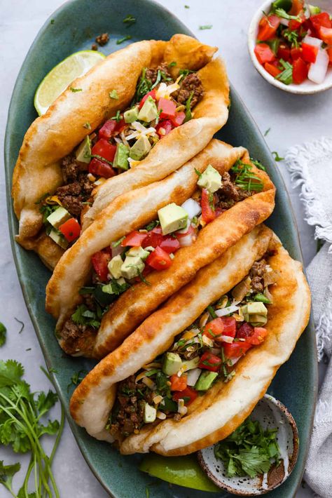 All your favorite taco fixings inside a warm, fluffy piece of fried bread! Homemade chalupas are a knockout dinner the whole family will go crazy over. Homemade Chalupas, Chalupas Recipe, Chalupa Recipe, Taco Fixings, Pork Carnitas Tacos, Slow Cooker Jambalaya, Ricotta Meatballs, Fried Bread, The Recipe Critic