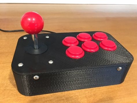 Build your own classic arcade game controller!  Perfect for a retro arcade game console such as RetroPie.   There are a number of arcade joystick… Arcade Controller, Arcade Bartop, Diy Arcade Cabinet, Gaming Computer Setup, Diy Arcade, Arcade Table, Arcade Joystick, Arcade Stick, Game Diy