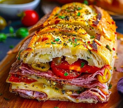 Classic Italian Muffuletta Sandwich Recipe - The Italian-American Page Muffaletta Bread, Muffaletta Recipe, Olive Salad Recipe, Muffaletta Sandwich, Muffuletta Sandwich, Italian Butter Cookies, Genoa Salami, Italian Sandwich, Olive Salad