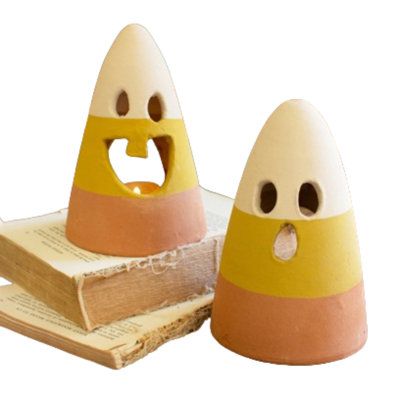 Light up these candy corn lanterns for sweet delight on fright night. This set of two candy corn characters with funny faces brings big smiles. Each lantern is 7" tall. | The Holiday Aisle® SET OF TWO CANDY CORN LANTERNS 7.0 x 5.0 x 5.0 in | C100844296 | Wayfair Canada Clay Candy Corn, Halloween Clay Ideas Easy, Diy Halloween Clay Crafts, Halloween Clay Sculpture, Cute Halloween Clay Ideas, Air Dry Clay Halloween Crafts, Air Dry Clay Halloween Ideas, Clay Lanterns Ideas, Halloween Air Dry Clay Ideas