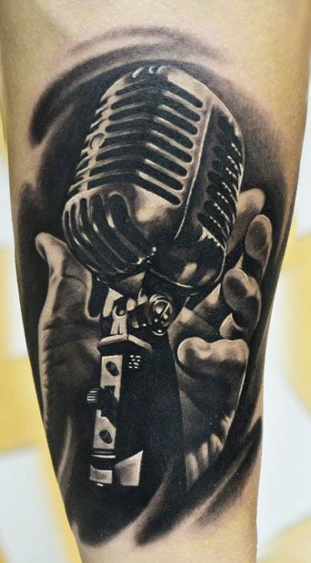 Love it! On my inside forearm without the hand. I want a quote with it. Maybe " I haven't understood a bar of music my whole life, but I have felt it" because i sing and play by ear. Never learned to read music. Mic Tattoo, Rockabilly Tattoos, Microphone Tattoo, Alas Tattoo, Music Tattoo Sleeves, Music Notes Tattoo, Music Tattoo Designs, Note Tattoo, Geniale Tattoos