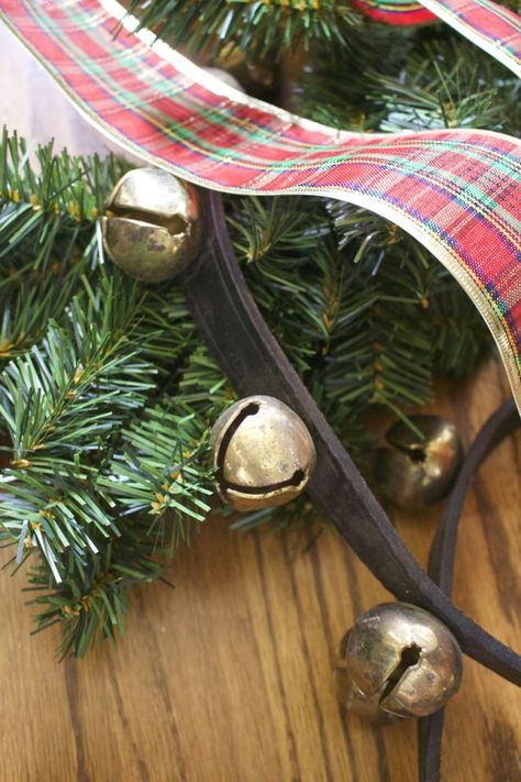 Sleigh Bell Christmas Wreath Sleigh Bell Wreath, Decorate With Sleigh Bells, Sleigh Bells Decorations, Bell Christmas Wreath, Winter Arrangements, Christmas Stories, Way To Save Money, Bell Christmas, Bell Decorations