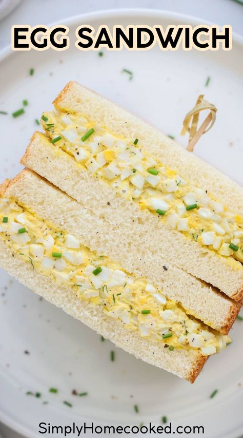 This Egg Sandwich is so simple and makes a great meal. Creamy, tangy egg salad is tossed with fresh herbs and placed between soft, buttered bread for a truly tasty dish. Creamy Egg Sandwich, Egg Mayo Sandwich, Buttered Bread, Sandwich Cream, Fried Egg Sandwich, Sandwiches Recipes, Egg Sandwich Breakfast, Egg And Cheese Sandwich, Sandwich Sides