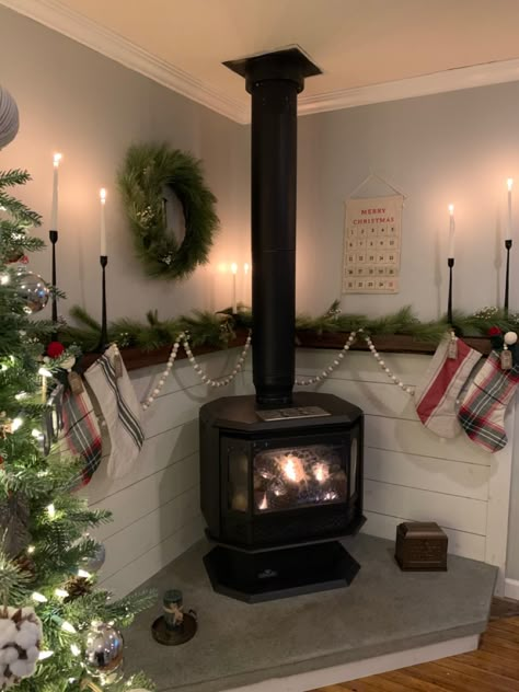 Stove Fireplace Decire, Wood Burning Stove Wood Storage, Christmas Decor Around Woodstove, Christmas Wood Stove Decor, Faux Wood Stove Surround, Word Burning Stove Ideas, Pot Belly Wood Stove, Mantle Above Wood Stove, Corner Stove Mantle