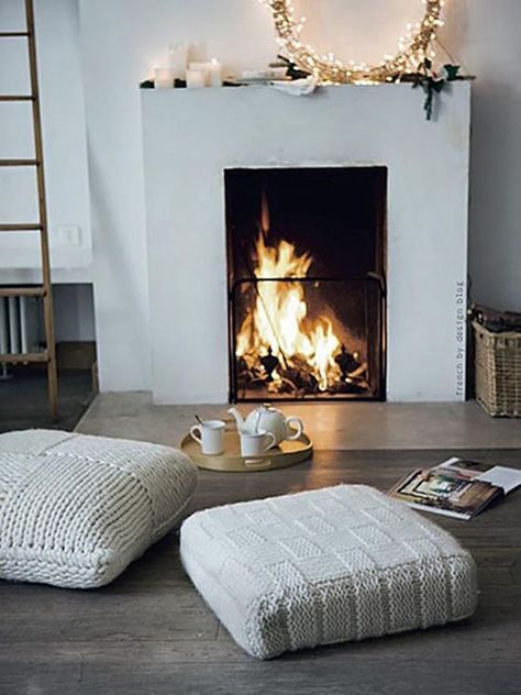 The 21 Most Gorgeous Fireplaces We've Ever Seen - Camille Styles Floor Pillows Living Room, Pouf Seating, Design Camino, Winter Living Room, Gorgeous Fireplaces, Warm Home Decor, Floor Seating, Design Del Prodotto, Winter Home Decor