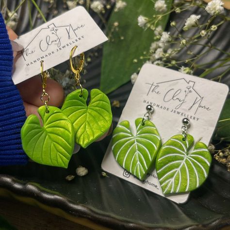 Love your leaves? The collective of green drop earrings is super fun, vibrant and summery-  a fun finishing touch to any outfit!   My earrings are made from lightweight polymer clay, stainless steel posts and metal jump rings! Each earring card is PLANTABLE! so just add the card and water to the soil, and watch your plant grow! Each pair of earrings are uniquely crafted by myself to be one of a kind from a different part of the clay slab, so each pair will be as individual as you!  ~Returns~ Due Polymer Clay Leaf Earrings, Leaf Earrings Clay, Plant Earrings Clay, Polymer Clay Monstera Leaf, Monstera Polymer Clay Earrings, Leaf Polymer Clay Earrings, Polymer Clay Leaves, Unique Green Polymer Clay Earrings, Playful Green Polymer Clay Jewelry