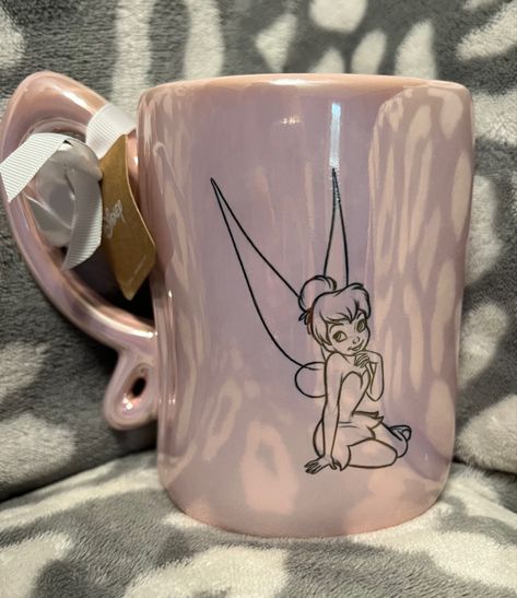 Rae Dunn Tinker Bell Iridescent Pink Mug Pink Mugs, Pink Mug, Mugs Aesthetic, Awsthetic Mug, Cute Mugs Disney, Fairy Mug Ceramics, Disney Princess Mugs, Disney Coffe Mugs, Disney Coffee Mugs