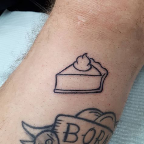 Quinn Harlock 🇭🇺🇨🇦 on Instagram: “A slice of pie for my boyfriend, Todd, the chef. Thanks babes!😘🥧 #fantalitytattoo #pietattoo #foodtattoo #tinytattoo #fillertattoo” Small Pizza Slice Tattoo, Cutie Pie Tattoo, Piece Of Pie Tattoo, Slice Of Pie Tattoo, Pie Tattoo Ideas, Pie Slice Tattoo, Pie Tattoo Simple, Pumpkin Pie Tattoo, Cheesecake Tattoo