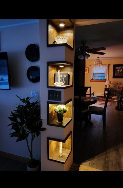 These are the shelves I made that went viral on tiktok. My customer had originally wanted to widen the doorway to her dining room, but the way the support for the second floor and plumbing chase was configured left us with this awkward corner that I couldn't take out without restructuring the house, which wasn't in the budget. I offered this solution to make the wasted space in the corner look like less of a design flaw and everyone loves the new addition. Bedroom Pillar Decor, Doorway Corner Decor, Odd Corners In Living Room, Beautiful Corners In The House, Awkward Hallway Ideas, Corner Wall Decorating Ideas, Awkward Corner Decor, Corner Wall Ideas, Corner Shelves Design