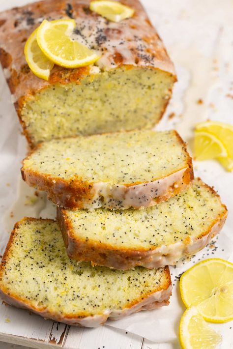 My Lemon Poppyseed Cake has a moist, tender crumb, is studded with plenty of poppyseeds and full of natural lemony citrus flavors. The cake is infused with a lemon simple syrup to keep it ultra-moist and is finished with a simple lemon icing. #lemoncake #lemonpoppyseed #lemonpoppyseedcake #lemonpoppyseedbread #lemonloaf #springdesserts #summerdesserts #lemondesserts #krollskorner Lemon Poppy Loaf, Lemons Cake, Lemon Simple Syrup, Lemon Poppy Seed Loaf, Poppy Seed Cake Recipe, Poppyseed Cake, Syrup Cake, Lemon Poppyseed Bread, Lemon Poppyseed Cake