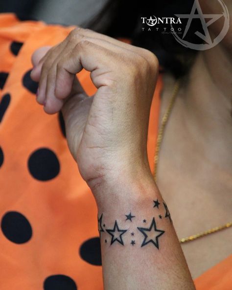 Star Arm Band Tattoo, Star Band Tattoo, Inner Thigh Tattoos, Star Tattoo On Wrist, Blessed Tattoos, Tattoo Band, Stars Tattoo, Pawprint Tattoo, Band Tattoo Designs