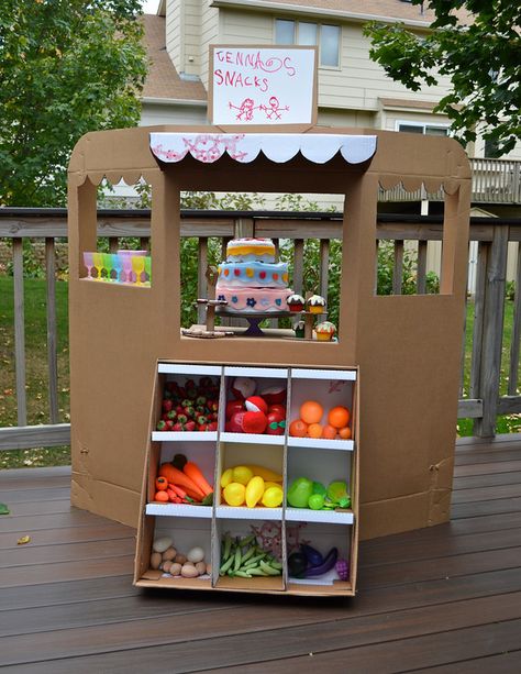 I'm still procrastinating, you guys. So last night I thought I'd play with cardboard - the grandest way I know to avoid sewing things I'm ... Cardboard Forts, Carton Diy, Kids Market, Ikat Bag, Cardboard Toys, Cardboard Box Crafts, Diy Cardboard, Dramatic Play, Kid Crafts