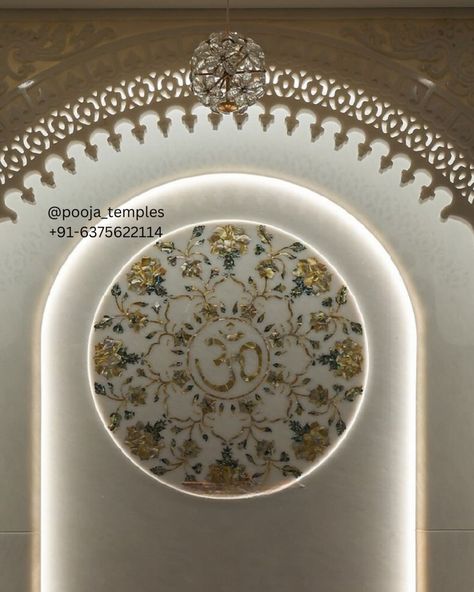 Introducing the exquisite White Marble Mandir by Harishyam Arts, a perfect blend of traditional craftsmanship and modern elegance. This masterpiece features intricate marble jali arch designs, hand-carved with precision to bring a touch of divinity into your home. The stunning centerpiece is a circular inlay adorned with floral motifs and the sacred "Om" symbol, meticulously crafted using fine inlay work that adds a luxurious feel to the temple. Each detail, from the ornate pillars to the de... Luxury Mandir, White Marble Mandir, Marble Mandir, Arch Designs, Om Symbol, The Temple, Floral Motifs, Modern Elegance, White Marble