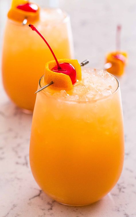 Enjoy all the tropical flavors of the Bahama Mama, the MOST POPULAR drink in the Bahamas, but with FEWER CALORIES. I will show you how with this INSTANT VACATION in a glass! Bahama Mama Drink Recipe, Pool Treats, Bahama Mama Drink, Bahama Mama Cocktail, Classy Cocktails, French Fry Seasoning, Boat Drinks, Malibu Drinks, Coctails Recipes