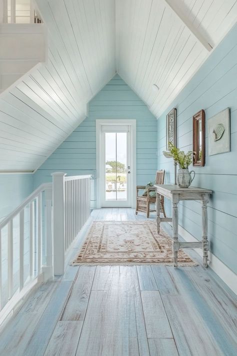 Add texture and coastal charm to your space with pastel blue shiplap walls. This classic beach house look pairs well with white and sandy tones, evoking a relaxing seaside retreat. Pastel Beach House, Blue Shiplap, Classic Beach House, Shiplap Walls, Pastel Beach, Ship Lap Walls, Pastel Blue, Beach House, Pastel