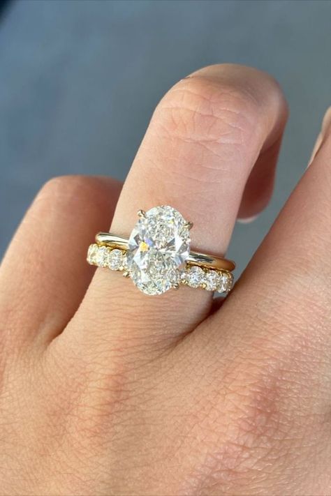 Round Cut Full Eternity Band With Oval Cut Moissanite Diamond Solitaire Ring, Yellow Gold Set Of Two Rings Pictures Of Hands, Oval Bridal Set, Hands With Rings, Oval Wedding Band, Gold Oval Engagement Ring, Gold Band Engagement Rings, Dream Wedding Ring, Oval Solitaire Engagement Ring, Stunning Diamond Rings