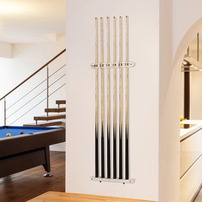 Keep your cues neatly organized and stylishly stored with this wall mount pool cue stick rack.**Pool cues not included** Whether playing pool in your home game room, garage, or in a bar or restaurant setting, this 2-piece wall mounted vintage whitewashed wood billiards pool cue holder storage rack is a great way to keep your pool cues easily accessible and add a touch of rustic charm to any dcor. Easy to mount to any flat wall surface with its included mounting hardware, this billiards organizer Pool Sticks Holder, Pool Stick Storage, Pool Cue Storage, Modern Wainscoting, Pool Rack, Pool Cue Holder, Stick Storage, Hidden Pool, Wainscoting Wall